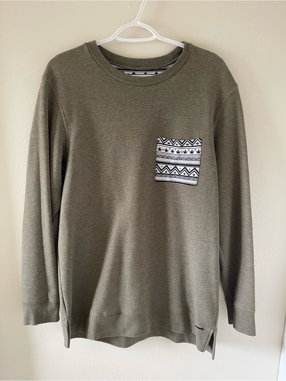 on the byas Olive Crewneck Sweater with Black & White Patterned Pocket